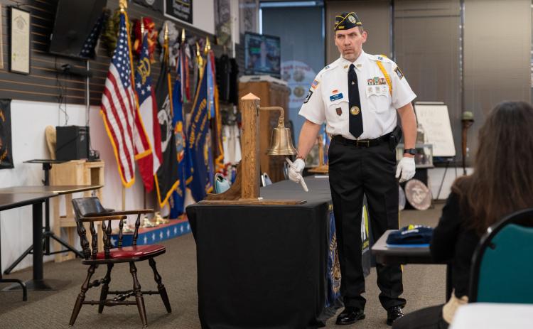 American Legion Post 84 Commander Jim Morgan rings the bell for the lives lost in wars around the world throughout American history. ZACH TAYLOR/Staff