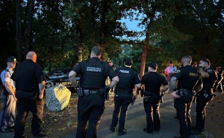 Law enforcement personnel gather immediately after the arrest of Jonathan William Harris, 34, of Sautee, on Thursday night off Toccoa Highway. Habersham County Sheriff’s Office/Submitted