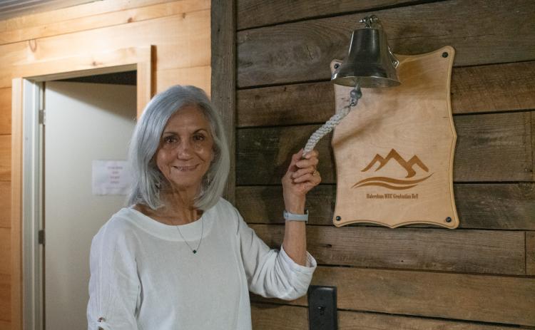 Myra Chandler rings the graduation bell at Mountain Education in Habersham. Chandler has celebrated her own graduation of sorts after retiring from Mountain Education after 16 years of counseling at the school, and a career in education and counseling that spans 54 years in total. Chandler is still involved with the school in a public relations role. HANNAH CAUDELL/Staff