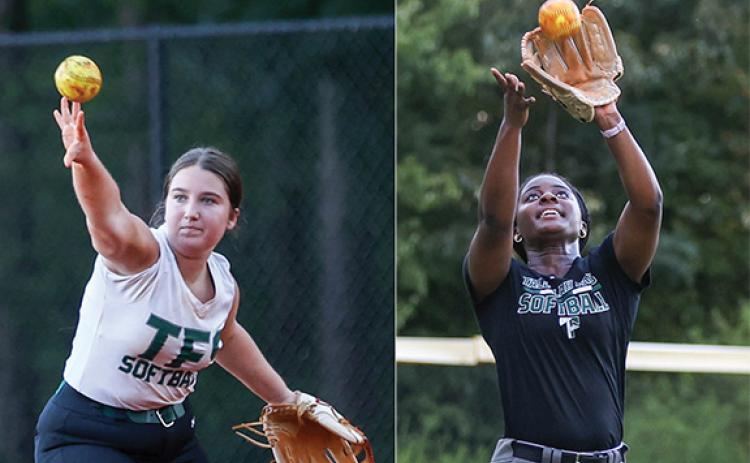 Ellie Shaw, left, throws the ball and Kaylin Pickett, right, catches one during softball practice at Tallulah Falls School on Tuesday, July 29. (Landen Todd/Staff)