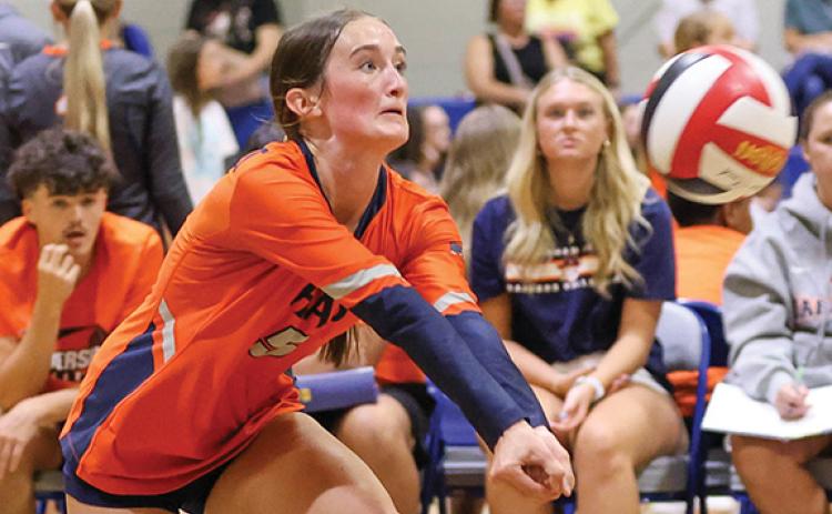 Habersham Central sophomore Marissa McCallister (5) hits the ball during a volleyball match at Banks County High School on Tuesday, Aug. 19. (Landen Todd/Staff)
