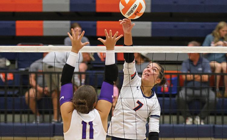 Habersham Central freshmen Leah Williams (7) hits the ball over the net. (Landen Todd/Staff)