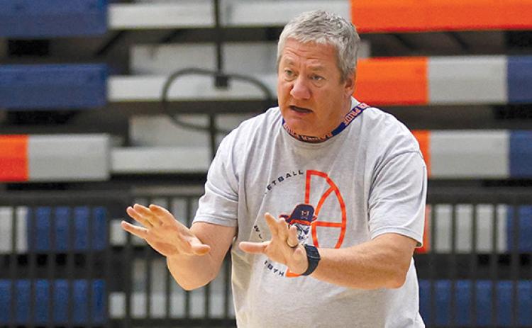 Girls Basketball Head Coach Bill Bradley, seen above at the girls basketball camp in June, is resigning from his role as girls basketball head coach.  (Landen Todd/Staff)