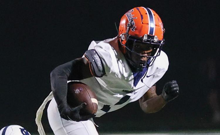 Habersham Central senior wide receiver Tylon Davis (1) runs after a catch during the football game between Habersham Central and White County at Warrior Stadium on Friday, Aug. 29. (Landen Todd/Staff)