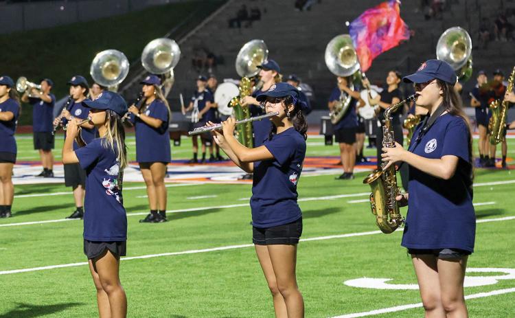 The Band of Blue performs during an early season halftime show. (Landen Todd/Staff)