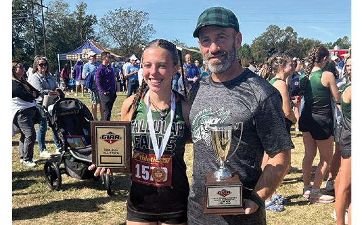 Junior All-State honors harrier Olivia Henderson and Head Varsity XC and Track and Field Coach and assistant Athletic Director Jamie Jimison present thier GIAA state awards at the end of the season.  (Submitted)