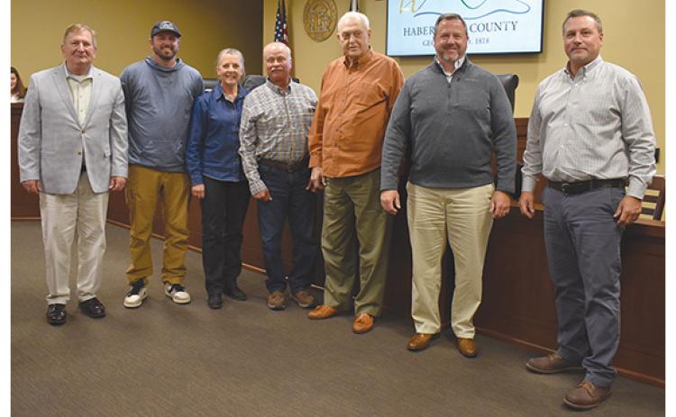 Habersham County Board of Commissioners — Bruce Harkness, Jimmy Tench, Kelly Woodall and Ty Akins —recognizes Farm-City Week with Habersham County Farm Bureau representatives (center) Jared Brooks, Cheryl Kowalsky and Jimmy Kowalsky. (Samantha Sinclair/Staff)