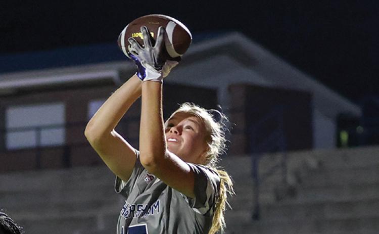 Habersham Central sophomore receiver Macy Huff (15) snags the ball for an extra point during a flag football game at Raider Stadium on Wednesday, Nov. 19. (Samantha Sinclair/Staff)