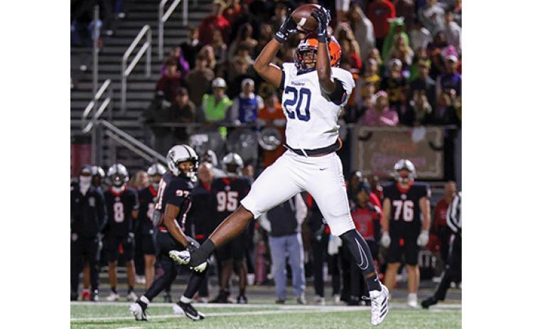 Habersham Central junior linebacker Griffin Cunningham (20) snags an interception during a football game between Habersham Central and Jackson County for the region championship at Panther Stadium on Friday, Oct. 31. (Landen Todd/Staff)