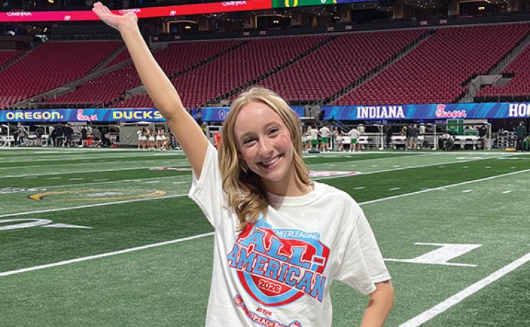 Habersham Central senior Corie Jones poses on the field at the Mercedes-Benz Stadium. The three year All American went through a tryout process to individually perform the All American camp cheer and supreme routine dance in front of a panel of judges. Forty-nine cheerleaders from all across Georgia and surrounding states made the cut. (Submitted)