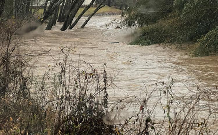 Water rises in the river Saturday afternoon. (Zach Taylor/Staff)
