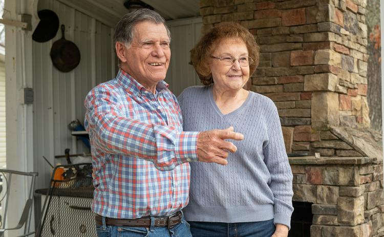 Buford and Doris Lewis look at the future of their garden in preparation for spring. Below, school photos show Buford and Doris around the time they were married. (Zach Taylor/Staff)