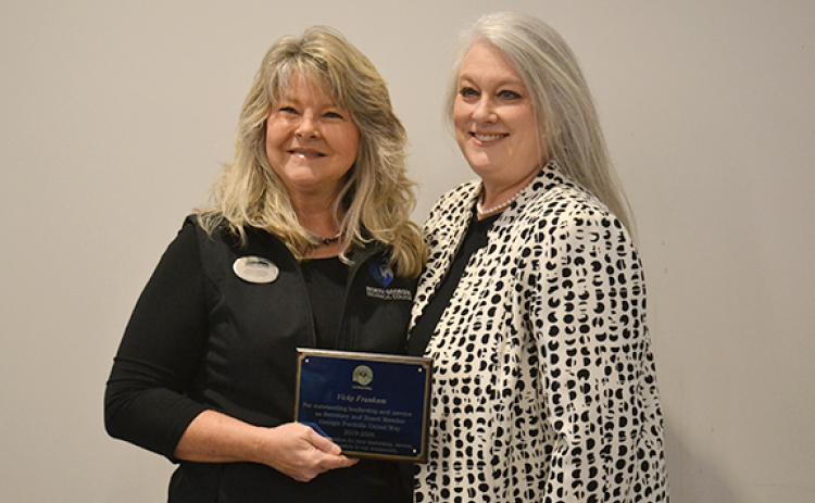 Vicky Frankum and Georgia Foothills United Way President and CEO Shelby Ward smile for a photo after the organization honored Frankum with an award for her time serving as the United Way secretary and board member for seven years. (Hannah Caudell/Staff)