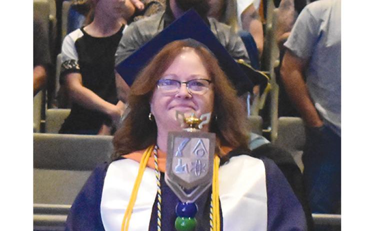 Sharon McFarland leads the processional into the auditorium at Level Grove Baptist Church during North Georgia Technical College’s commencement ceremony last year. This year’s ceremony will be held in the new Dr. Mark A. Investor Center for Living and Learning. (Samantha Sinclair/Staff)