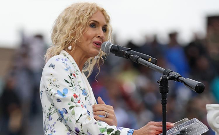 Country singer Kimberly Schlapman speaks at the Habersham Central High School graduation ceremony at Raider Stadium on Friday, May 22. (Landen Todd/Staff)