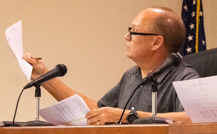 Baldwin Councilmen Joe Elam reviews preliminary budget numbers for the city.  (Hannah Caudell/Staff)