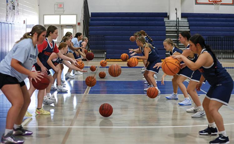 Habersham Central basketball players work on drills during a basketball practice at Hilliard A. Wilbanks Middle School on Monday, June 15. (Landen Todd/Staff)