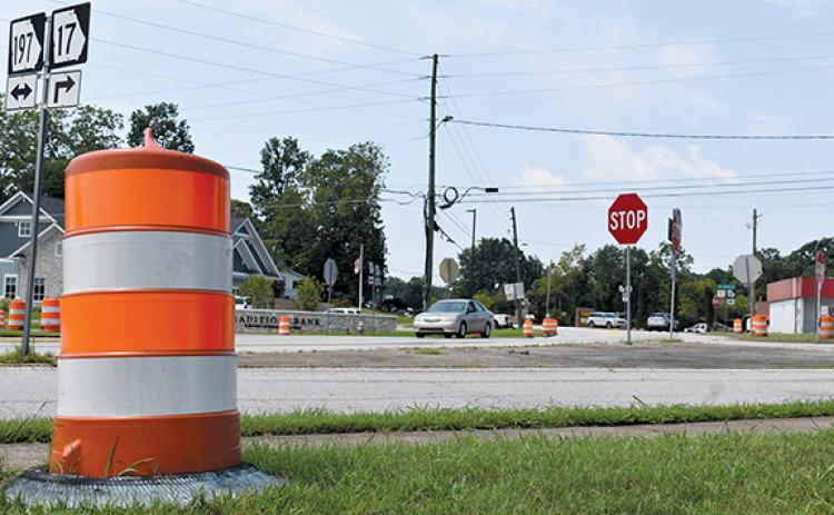 Traffic cones begin to appear as the start date for construction on the roundabout approaches. (Noah Ansley/Staff)