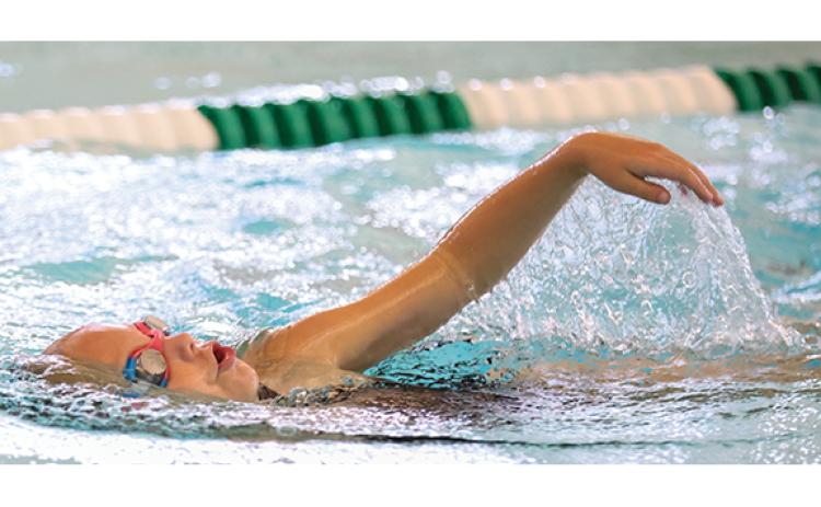 TFS junior swimmer Harper Barrett swims during a practice at the TFS Natatorium on Thursday, July 9. (Landen Todd/Staff)