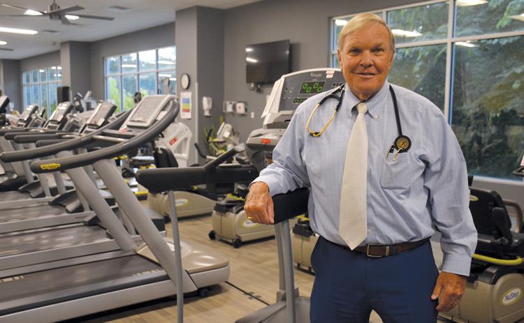 Dr. Stuart Sanders stands the plethora of equipment now available in the Rehabilitation and Orthopedics Complex at NGMC Habersham. When he started the rehabilitation program, it had only three pieces of equipment. (Samantha Sinclair/Staff)
