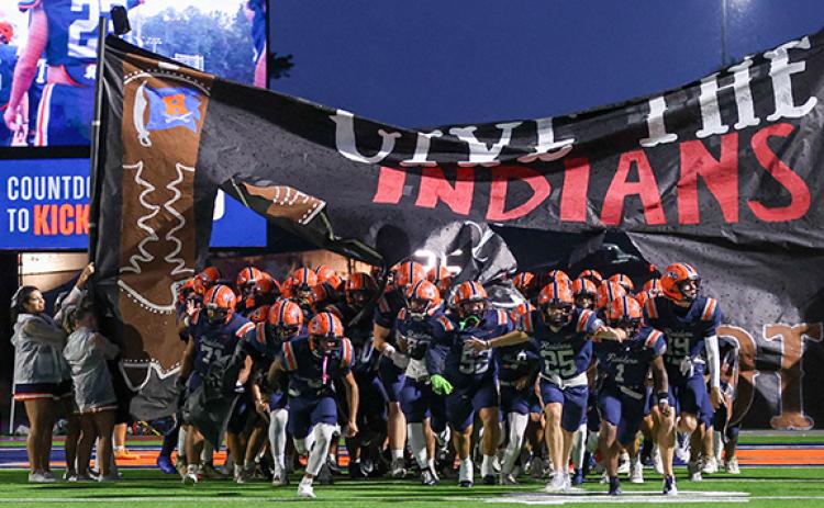 Habersham Central players run on to the field during last year’s game against Stephens. (Landen Todd/Staff)