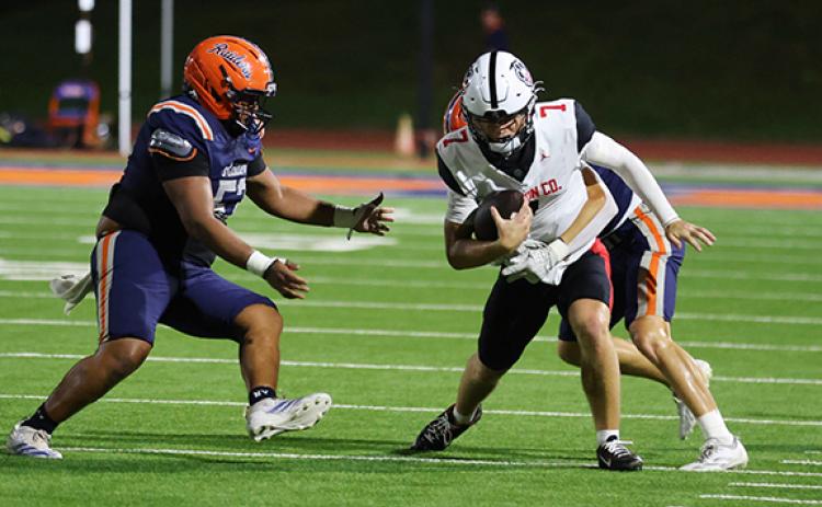 Habersham Central defensive tackle Leo Tomas (53) goes for the tackle during a football game between Jackson County and Habersham Central tonight. (Landen Todd/Staff)
