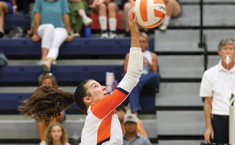 Habersham Central sophomore Leah Williams (7) attacks the ball during a volleyball match between Banks County and Habersham County at the Raider Gymnasium on Tuesday, Aug. 18. Williams had eight kills and one ace against Walnut Grove on Thursday, Sept. 10. (Landen Todd/Staff)