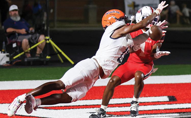 Habersham Central senior defender Jay Feltus (11) makes a play on the ball during a high school football game between Habersham Central and Loganville at Red Devil Stadium on Friday, Sept. 18. (Landen Todd/Staff)