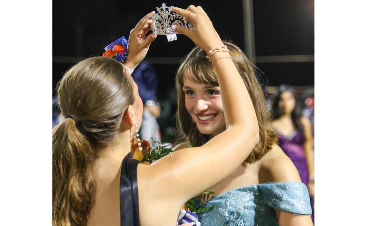 Ellie Smith is crowned queen during the homecoming ceremony at Raider Stadium on Friday, Sept. 25. The Homecoming theme was An Evening in Wonderland. (Landen Todd/Staff)