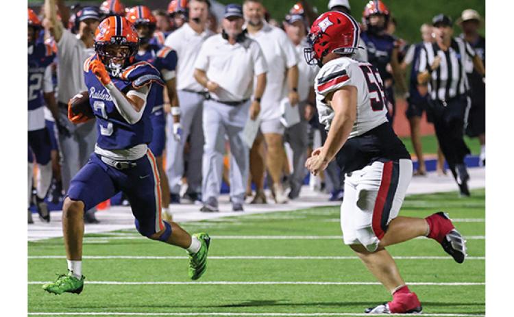 Habersham Central senior linebacker CJ Davis (3) runs with the ball after intercepting it during the football game between Stephens County and Habersham Central at Raider Stadium on Friday, Aug. 28. (Landen Todd/Staff)