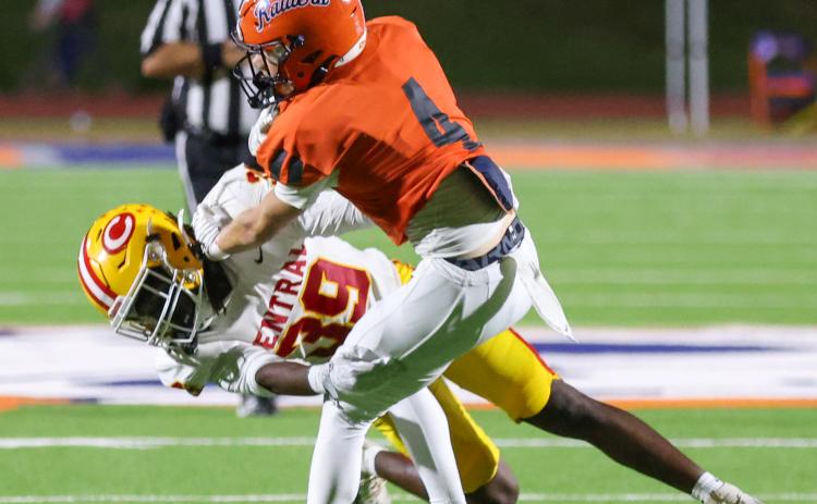 Habersham Central senior Parks York (4) tries to stiff arm defender during the football game between Clarke Central and Habersham Central at Raider Stadium on Friday, Oct. 9. (Landen Todd/Staff)