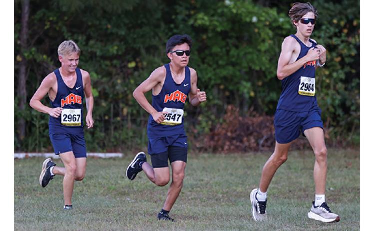Habersham Central runners Jackson Weeks, Domani Cortez and Jadyn Recor in action during the Banks County Home Meet on Wednesday, Oct. 14. (Landen Todd/Staff)