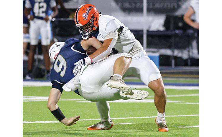 Habersham Central senior linebacker Corbett Dover (17) makes a tackle during the football game between Habersham Central and Apalachee at Harrison Stadium on Friday, Oct. 2. (Landen Todd/Staff)