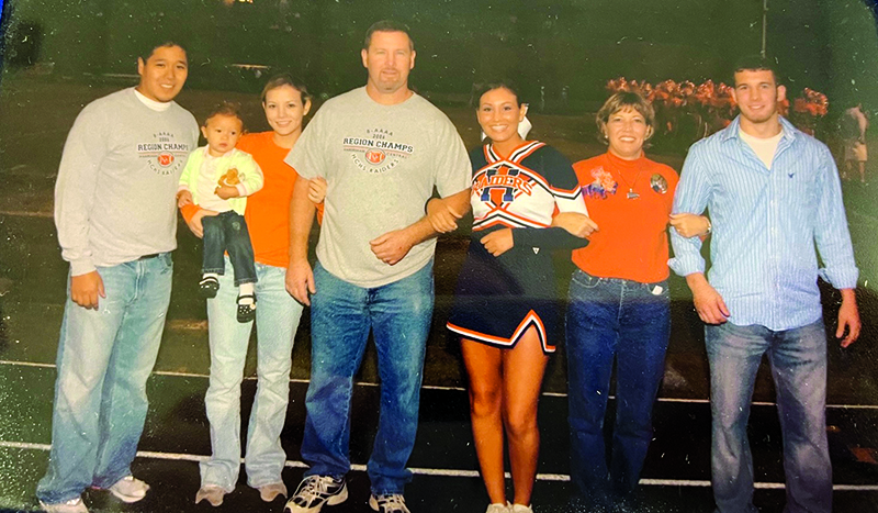 Three decades of Raiders celebrate Brooke Roberts’ senior night as a Habersham Central cheerleader in the fall of 2007. From left: Ray Contreras, Kali Contreras (as a baby), Brittany Contreras, Mike Roberts, Brooke Roberts, Terri Roberts and Matt Roberts. SUBMITTED