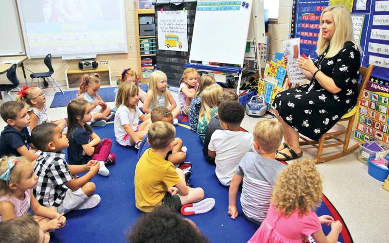 Habersham County Schools, along with the thousands of students who attend them, returned to “class as usual” Wednesday, Aug. 7. Shown is Clarkesville Elementary School kindergarten teacher Kristi Thurmond explaining classroom conduct to her students the morning of the first day of school. Prior to the first day, students and their parents/guardians turned out for open houses earlier this week. For additional back-to-school photos, see Page 6A, this edition.