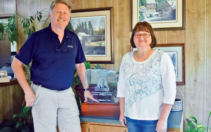 Greg Ansley has been working in his family business, A&A Electric Inc., in Cornelia since he was 12 years old. Debbie Beck, office manager, has been with the business for nearly 40 years. A&A Electric Inc. is celebrating its 50th anniversary this year. (Photo/CHAMIAN CRUZ)