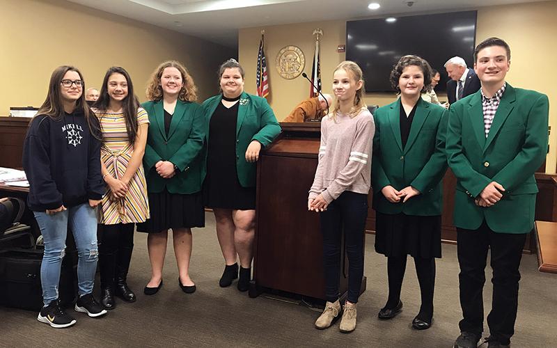 Habersham 4-H students honored at the Dec. 16 county commission meeting were, from left, Charisma Jenkins, Abby Horne, Christine Budd, Camden Hughes, Autumn Samsel, Rachel Dailey and Edwin Wood.