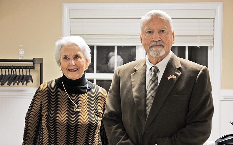 Council members Florence Wikle and John Popham were celebrated by friends and family at their last city council meeting.