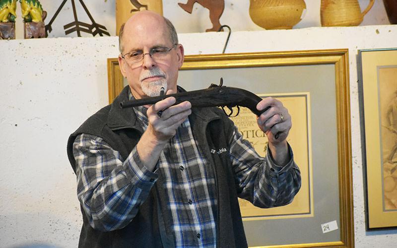 One of the many unique items auctioned off Friday at Once Upon a Time Co. in downtown Clarkesville was an “Indian used blacksmith made percussion pistol” from circa 1870.