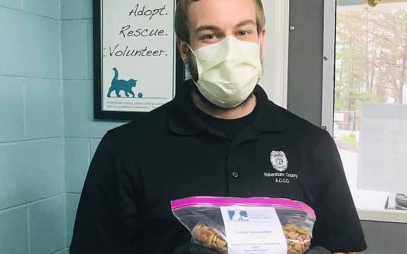 Habersham County Animal Care and Control Officer Mitchael Jenkins is ready to deliver free pet food to the community.