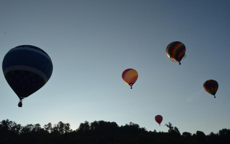 Stephanie Hill/ Soon after the race begins, hot air balloons scatter across White County en route to the finish line at Interstate 95. 