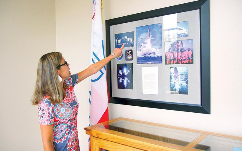 Tallulah Falls School Upper School Academic Dean Kim Popham observes the many keepsakes reminiscing when students and faculty won the opportunity to travel to the White House.
