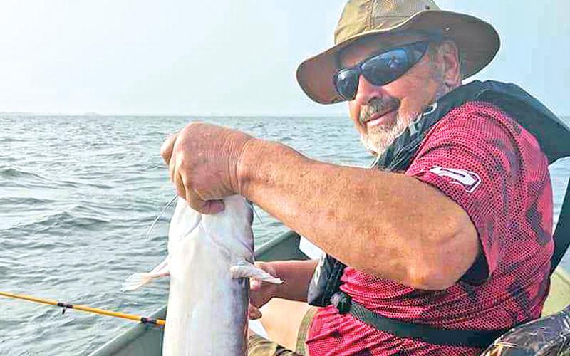 Richard Nichols is shown with a big catch from the weekend's fishing trip that ended abruptly.