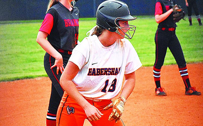 Habersham Central’s Taylor Wade eyes the pitcher while waiting to break from third base against Flowery Branch on Aug. 19.