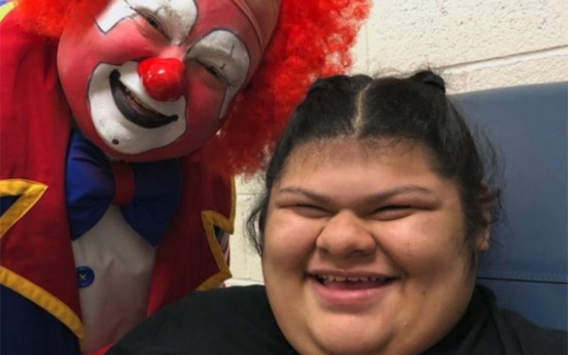 Lucero Ramirez was all smiles when a clown came to visit her school.