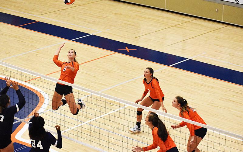 Habersham Central’s Allie Church gets up high going for a spike during a recent match.