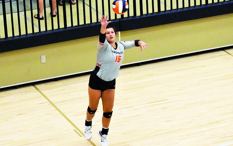Habersham Central's Maddie Chosewood serves during Tuesday's match. ISAIAH SMITH/Staff