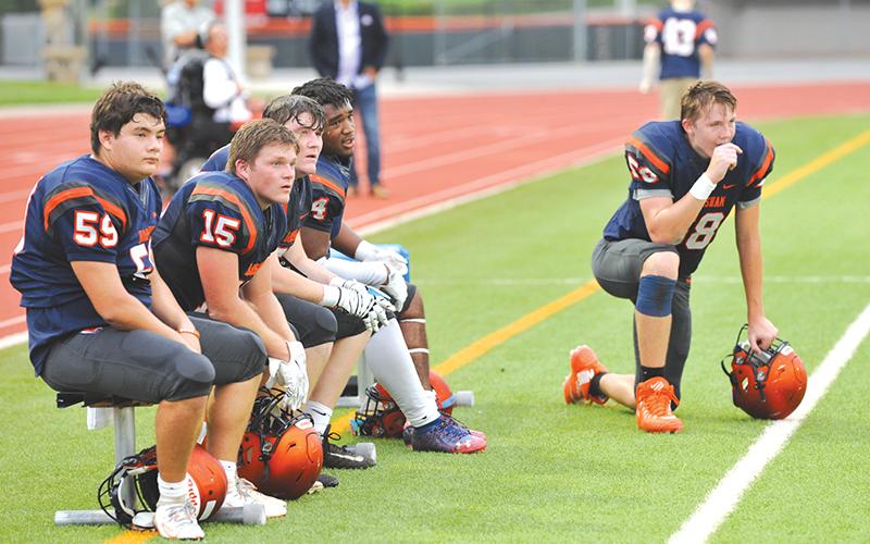 Habersham Central players (from left) Zane Hester, Patrick Tedder, Butch Cassidy, Simarcus Burney and Jonathan Adams watch intently from the sidelines during the intrasquad scrimmage last week. The first real game is Friday night when the Raiders host Madison County to open the season. TOM ASKEW/Special