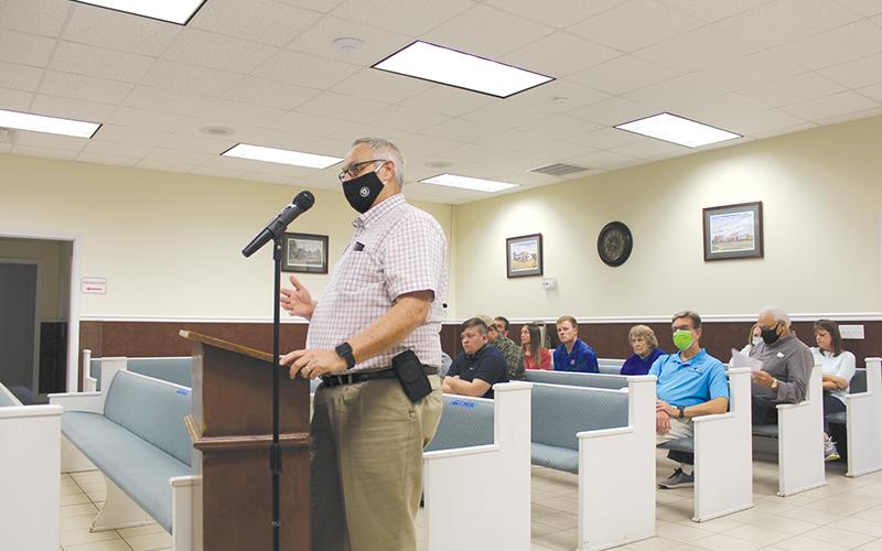 Baldwin resident Ronnie Franklin speaks at Tuesday’s city council meeting, expressing dismay with the proposed development slated for the Wilbanks and Thompson intersection.