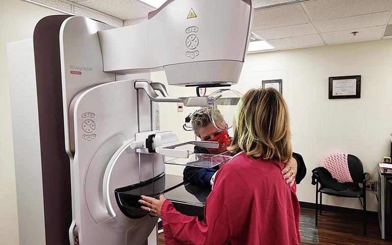 Renee S. Tice, Mammography Technologist at Habersham Medical Center helps a patient receive a mammography examination.